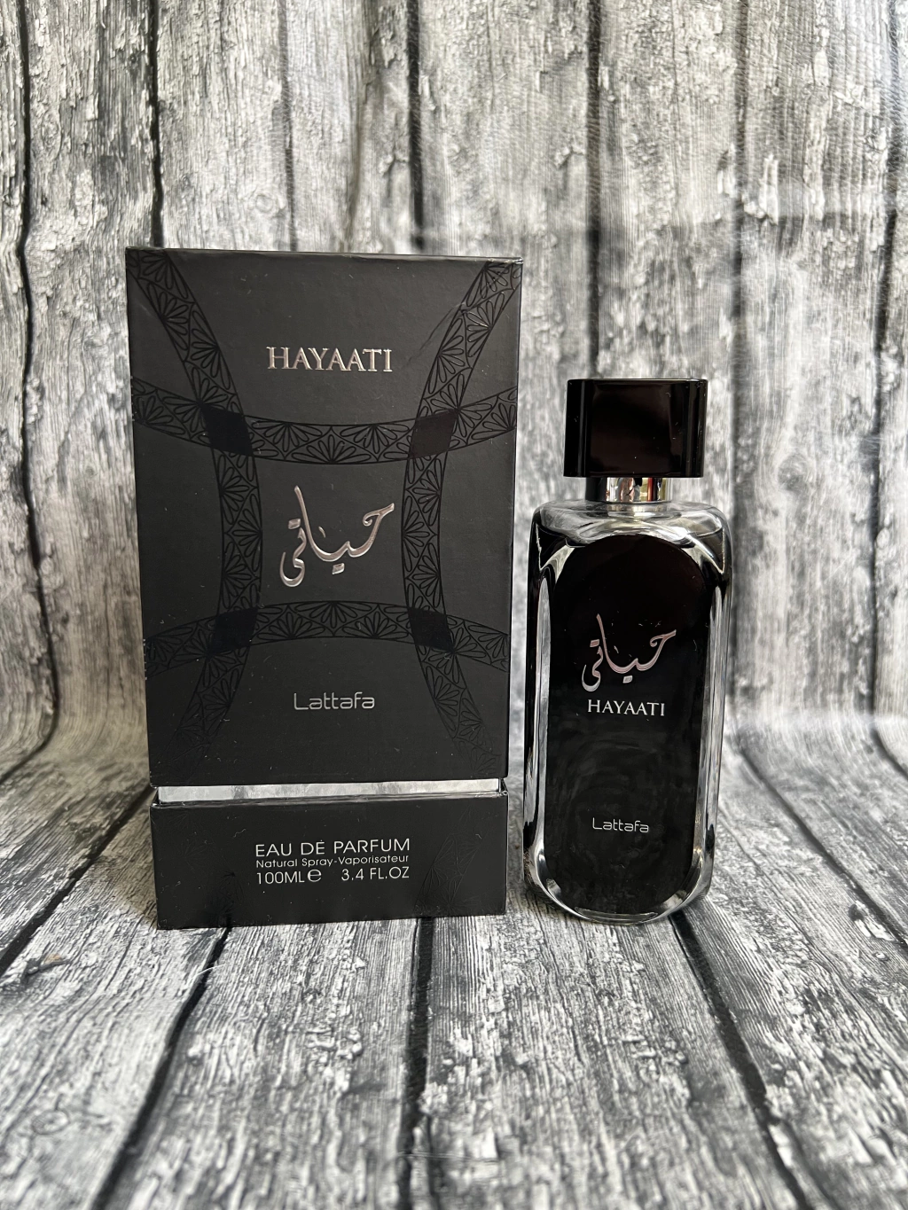 Frasco preto do perfume árabe masculino Lattafa Hayaati 100ml