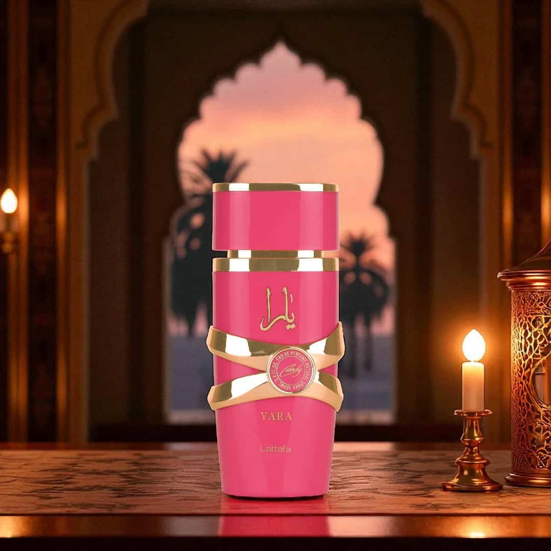 Frasco degradê rosa e amarelo do perfume feminino Lattafa Yara Candy 100ml frutado